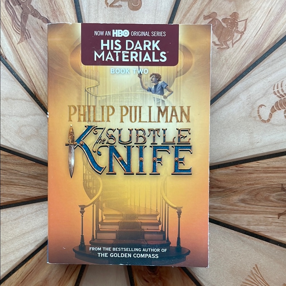 The Subtle Knife by Philip Pullman - Gold and Brown Cover